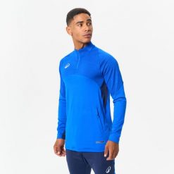 Bluza piłkarska Kipsta CLR Club na krótki suwak. Niebieskie bluzy bez kaptura męskie KIPSTA, l, z materiału. Za 139.99 zł.