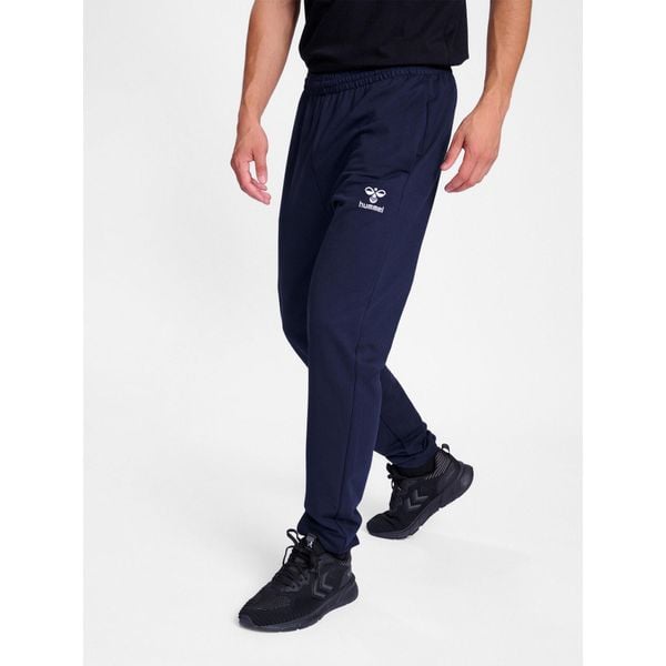 Spodnie do biegania Hummel Go 2.0. Niebieskie spodnie materiałowe męskie HUMMEL, bez wzorów, z bawełny, sportowe. Za 193.50 zł.