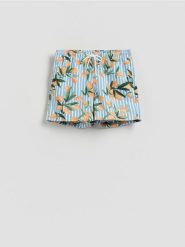 Wzorzyste szorty plażowe - żółty. Żółte szorty męskie Reserved, bez wzorów, z tkaniny. Za 79.99 zł.