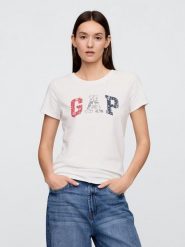 GAP Koszulka w kolorze kremowym rozmiar: XL. Brązowe bluzki damskie GAP, xl, bez wzorów, z bawełny, bez kołnierzyka, bez ramiączek. Za 74.63 zł.