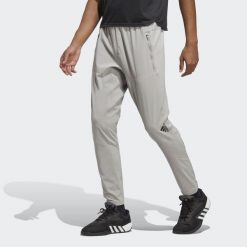 Spodnie D4T Training. Czarne spodnie sportowe męskie Adidas, z dzianiny. Za 247.99 zł.