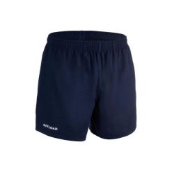 Spodenki do rugby R100 z kieszeniami. Niebieskie szorty męskie OFFLOAD, bez wzorów, z materiału. Za 39.99 zł.