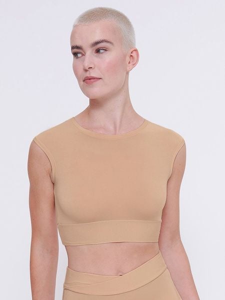 Sloggi Top w kolorze beżowym rozmiar: 36-42. Brązowe topy damskie Sloggi, bez wzorów, bez kołnierzyka. Za 52.95 zł.