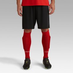 Spodenki piłkarskie Kipsta Essential. Czarne szorty damskie KIPSTA, bez wzorów, z materiału, sportowe. Za 29.99 zł.
