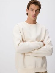 Gładka bluza z bawełną - złamana biel. Bluzy bez kaptura męskie Reserved, l, z bawełny. Za 109.99 zł.