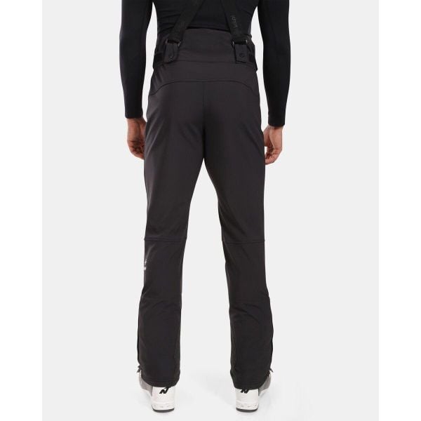 Spodnie narciarskie Kilpi Rhea. Czarne spodnie materiałowe męskie Kilpi, bez wzorów, sportowe. Za 473.69 zł.