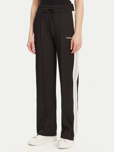 Guess Spodnie dresowe V5GB12 KCRU2 Czarny Regular Fit. Czarne spodnie dresowe damskie Guess, s, z aplikacjami, z dresówki. Za 379.99 zł.