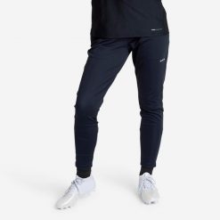 Spodnie do piłki nożnej damskie Kipsta Viralto. Czarne spodnie materiałowe damskie KIPSTA, bez wzorów, z elastanu, sportowe. Za 99.99 zł.