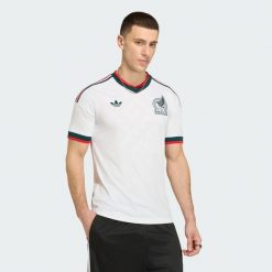 Koszulka wyjazdowa Meksyk 26. Białe t-shirty sportowe męskie Adidas, l, z dzianiny, bez ramiączek, do piłki nożnej, climacool (adidas). Za 439.00 zł.
