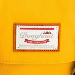 Plecak Doughnut. Żółte plecaki damskie Doughnut, bez wzorów. Za 289.99 zł.