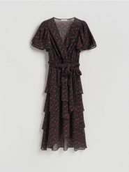 Wzorzysta sukienka midi - czarny. Czarne sukienki damskie Reserved, l, bez wzorów, z tkaniny, bez kołnierzyka, bez ramiączek, midi, rozkloszowane. Za 199.99 zł.