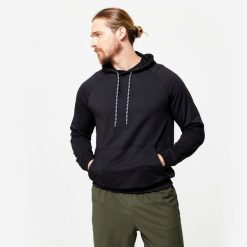 Bluza z kapturem męska Domyos fitness. Czarne bluzy sportowe męskie DOMYOS, bez wzorów, z elastanu, sportowe, bez kołnierzyka, bez ramiączek. W wyprzedaży za 59.99 zł.