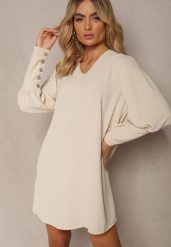Jasnobeżowa Pudełkowa Sukienka z Rozkloszowanym Dołem i Bufiastymi Rękawami Kaimana. Brązowe sukienki damskie Renee, na imprezę, s, bez wzorów, eleganckie, bez kołnierzyka, bez ramiączek, mini, rozkloszowane. W wyprzedaży za 59.49 zł.