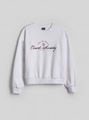 4F Bluza dresowa loose bez kaptura damska - biała S. Białe bluzy bez kaptura damskie 4f, l, z dresówki. Za 149.99 zł.