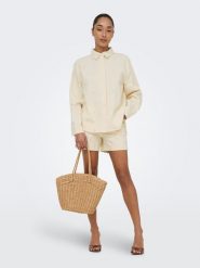 ONLY Bluzka w kolorze beżowym rozmiar: XL. Brązowe bluzki damskie Only, xl, bez wzorów, z bawełny, bez kołnierzyka, bez ramiączek. Za 144.58 zł.