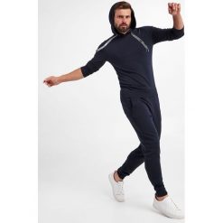 Spodnie dresowe JOOP! JEANS. Spodnie dresowe męskie Joop! Jeans, bez wzorów, z dresówki. W wyprzedaży za 465.57 zł.