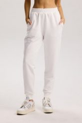 Damskie spodnie dresowe Rough Radical Cotton Active Joggers. Białe spodnie sportowe damskie ROUGH RADICAL, s, z bawełny, na fitness i siłownię. Za 135.90 zł.