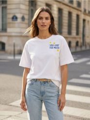 Bawełniana koszulka z napisem "You care too much" - biały. Białe t-shirty damskie Sinsay, l, bez wzorów, z bawełny, bez kołnierzyka. Za 29.99 zł.