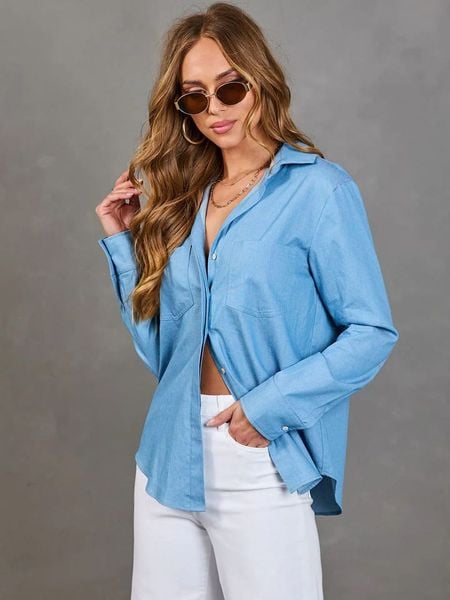 LA Angels Koszula w kolorze błękitnym rozmiar: M. Niebieskie koszule damskie LA Angels, m, bez wzorów, z bawełny, bez kołnierzyka, bez ramiączek. Za 164.95 zł.