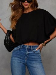 Milan Kiss Koszulka w kolorze czarnym rozmiar: S. Czarne bluzki damskie Milan Kiss, s, bez wzorów, bez kołnierzyka, bez ramiączek. Za 149.31 zł.