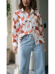 Milan Kiss Bluzka w kolorze biało-pomarańczowym rozmiar: S. Białe bluzki damskie Milan Kiss, s, bez wzorów, z wiskozy, bez kołnierzyka, bez ramiączek. Za 148.26 zł.