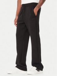 Guess Spodnie dresowe Z6BB04 K6545 Czarny Regular Fit. Czarne spodnie dresowe męskie Guess, z aplikacjami, z dresówki. Za 434.99 zł.