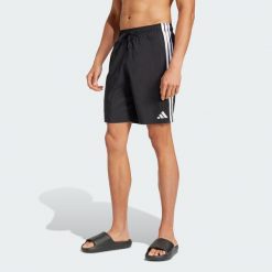Szorty do pływania 3-Stripes 8-Inch. Białe szorty męskie Adidas, bez wzorów, z materiału. Za 179.00 zł.
