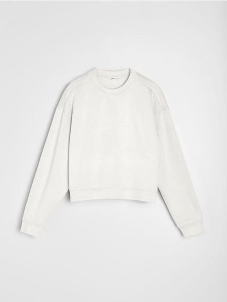 Bluza crewneck basic z dodatkiem wiskozy "soft touch" - kremowy. Białe bluzy bez kaptura damskie Sinsay, l, z dzianiny. Za 45.99 zł.