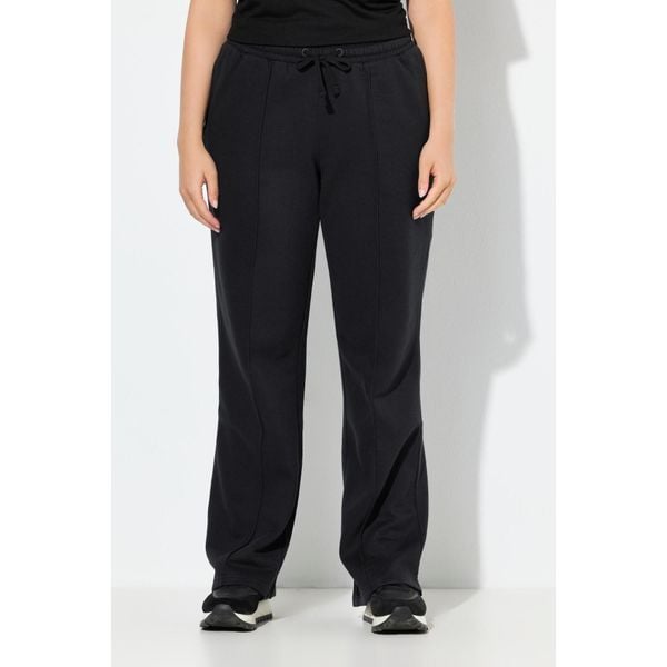Damskie Spodnie dresowe zaszewki szerokie nogawki elastyczny pas. Czarne spodnie dresowe damskie Ulla Popken, plus size, z bawełny. Za 239.99 zł.