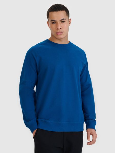 4F Bluza dresowa nierozpinana bez kaptura męska - niebieska XXL. Niebieskie bluzy bez kaptura męskie 4f, bez wzorów, z bawełny, sportowe, bez kołnierzyka, bez ramiączek. W wyprzedaży za 79.99 zł.