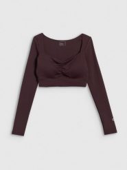 4F Crop top treningowy z niskim wsparciem damski 4F x Anna Lewandowska - brązowy L. Brązowe topy damskie 4f, l, bez wzorów, z materiału, bez kołnierzyka. Za 129.99 zł.