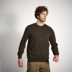 Sweter outdoor Solognac 100. Brązowe swetry męskie SOLOGNAC, l, bez wzorów, z elastanu, bez kołnierzyka. W wyprzedaży za 39.99 zł.