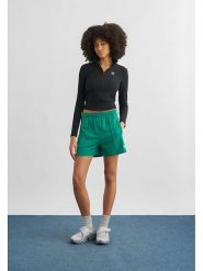 Adidas Szorty sportowe "Originals Firebird" w kolorze zielonym rozmiar: S. Zielone spodenki sportowe damskie Adidas, s, outdoorowe. Za 109.95 zł.