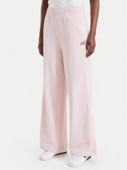 Lacoste Spodnie dresowe XF8392 Różowy jasny Regular Fit. Czerwone spodnie dresowe damskie Lacoste, bez wzorów, z bawełny. Za 594.99 zł.