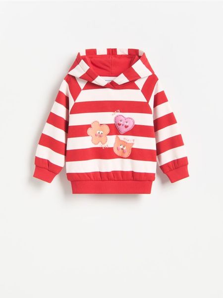 Bluza z kapturem - pastelowy róż. Czerwone bluzy i bluzki niemowlęce Reserved, bez wzorów, z bawełny, bez ramiączek, z kapturem. Za 55.99 zł.
