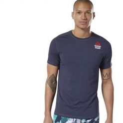 Koszulka sportowa męska Reebok AX8852. Niebieskie t-shirty sportowe męskie Reebok, m, z materiału, bez ramiączek, na fitness i siłownię. Za 219.99 zł.