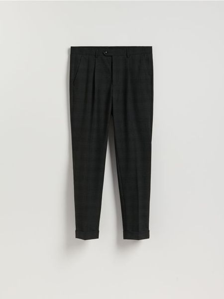 Garniturowe spodnie w kratę - czarny. Czarne spodnie wizytowe męskie Reserved, z tkaniny. Za 169.99 zł.