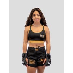 Damski biustonosz do mma Metal Boxe Hexagone. Czarne biustonosze sportowe damskie METAL BOXE, bez wzorów. Za 128.50 zł.