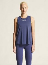 Craft Top sportowy "Core Essence" w kolorze granatowym rozmiar: XL. Niebieskie topy damskie Craft, xl, bez wzorów, z materiału, bez ramiączek. Za 62.03 zł.