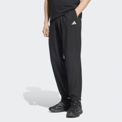 Spodnie sportowe męskie ADIDAS. Spodnie sportowe męskie Adidas, z materiału. Za 179.99 zł.