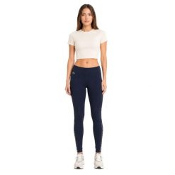 Spodnie damskie Lacoste sportowe treningowe legginsy granatowe. Niebieskie legginsy damskie Lacoste, uniwersalny, bez wzorów, z elastanu. Za 357.00 zł.
