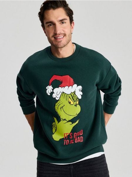 Bluza crewneck z nadrukiem Grinch - zielony. Zielone bluzy bez kaptura męskie Sinsay, l. Za 59.99 zł.