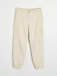 Spodnie cargo jogger - kremowy. Białe spodnie materiałowe męskie Sinsay, bez wzorów. Za 99.99 zł.