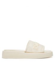 DKNY Klapki K2500541 Écru. Klapki damskie DKNY, bez wzorów, z materiału, bez obcasa. Za 389.99 zł.