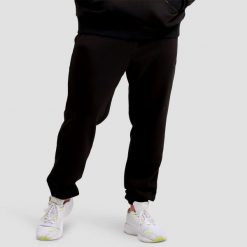 Spodnie męskie fitness regular Unity. Czarne spodnie sportowe męskie GYMBEAM, z bawełny. Za 118.90 zł.