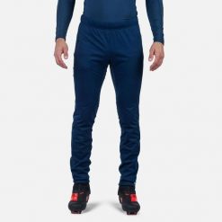 Spodnie softshell męskie Rossignol Genetys. Niebieskie spodnie materiałowe męskie Rossignol, bez wzorów, z softshellu, sportowe. Za 420.45 zł.