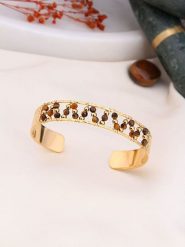 Charlize Pozłacana bransoletka z kryształami rozmiar: onesize. Brązowe bransoletki damskie Charlize, pozłacane. Za 100.28 zł.