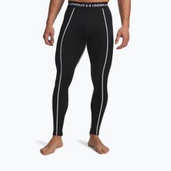 Legginsy Under Armour Cold Weather Grid. Czarne spodnie sportowe męskie Under Armour. Za 179.99 zł.