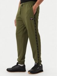 Reebok Spodnie dresowe Jacek RK25723CCM Zielony Regular Fit. Zielone spodnie dresowe męskie Reebok, bez wzorów, z dresówki. Za 259.99 zł.