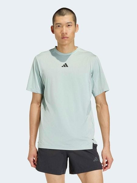 Adidas Koszulka sportowa w kolorze błękitnym rozmiar: L. Niebieskie t-shirty sportowe męskie Adidas, l, z materiału, bez ramiączek, outdoorowe, climacool (adidas). Za 129.95 zł.